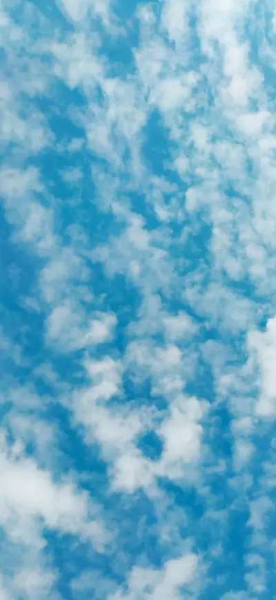 bright blue sky white fluffy clouds