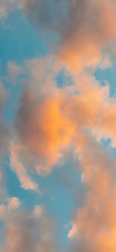 dreamy blue sky golden clouds sunset