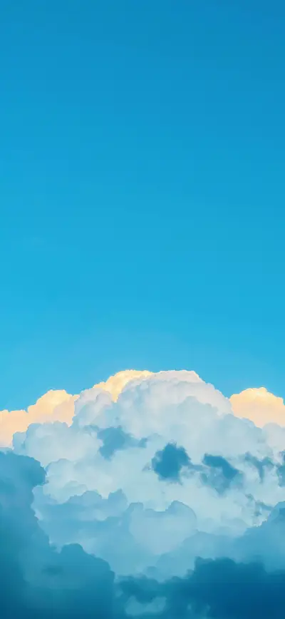 dreamy blue sky golden clouds