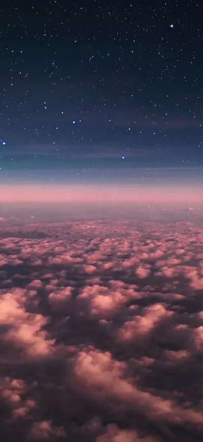 dreamy pink clouds starry night sky