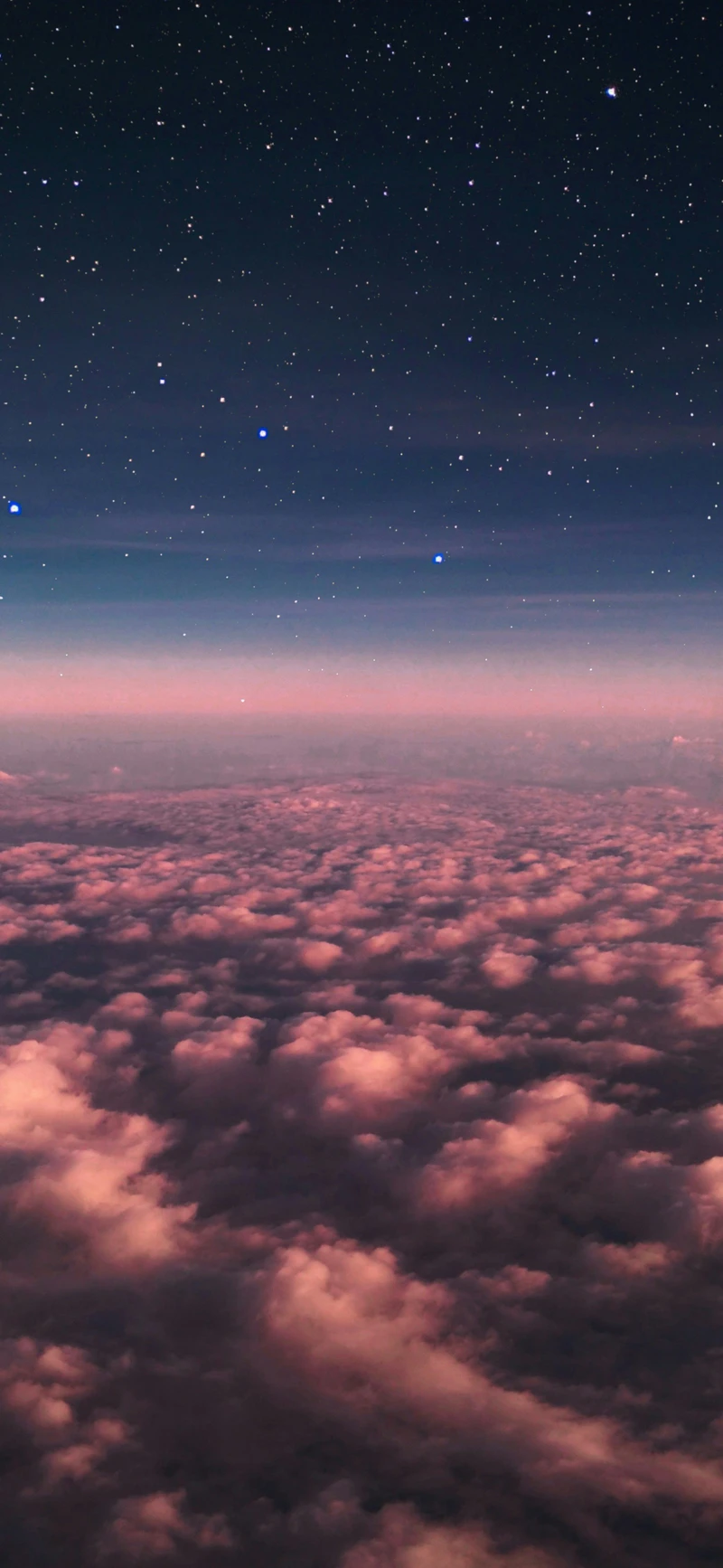 dreamy pink clouds starry night sky