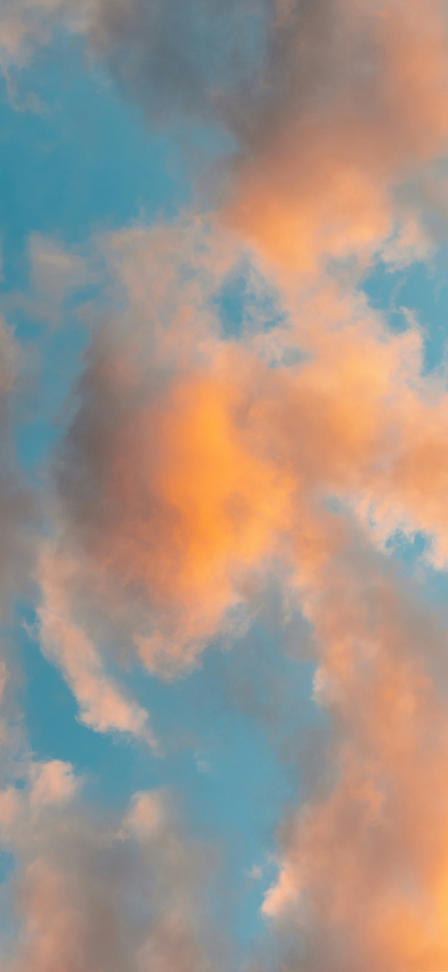 dreamy blue sky golden clouds sunset