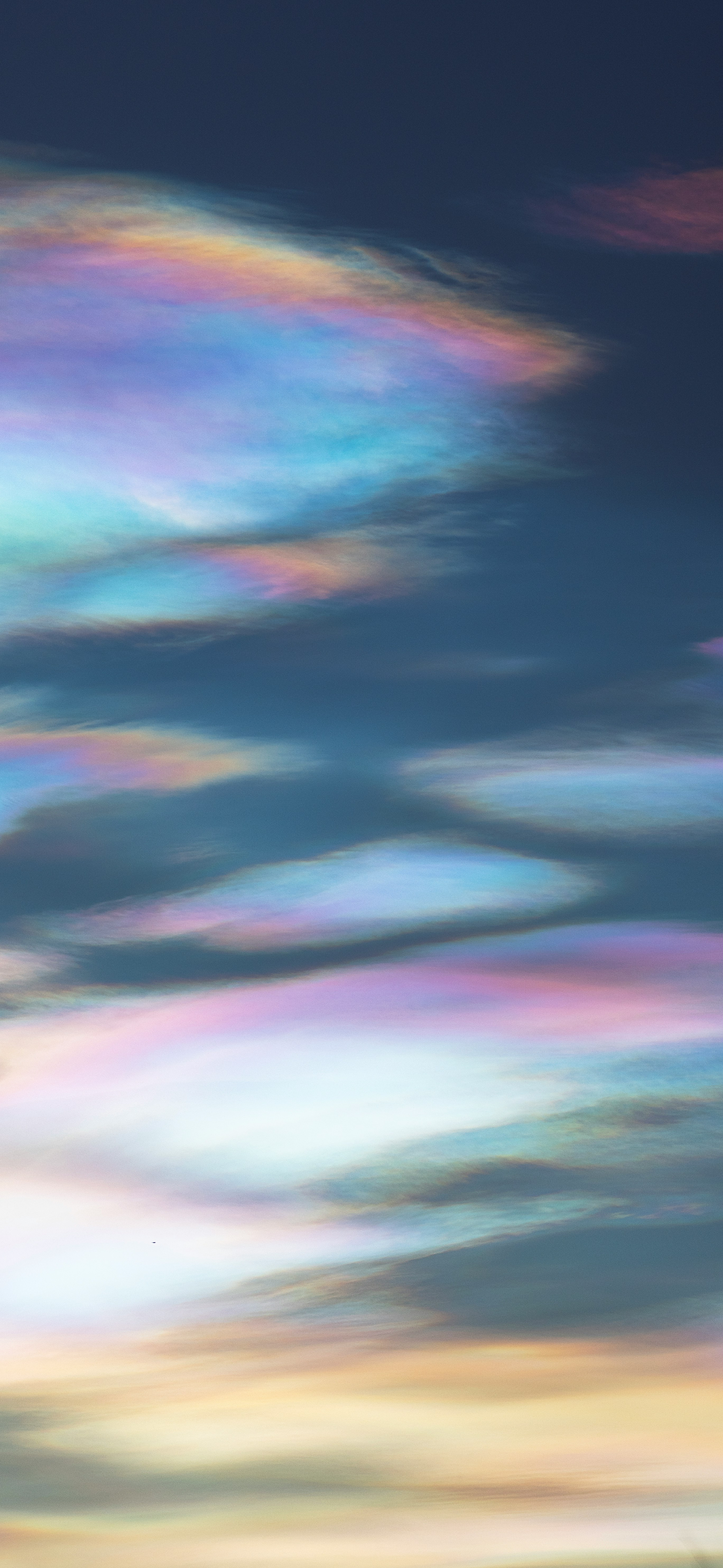 iridescent rainbow clouds dreamy sky